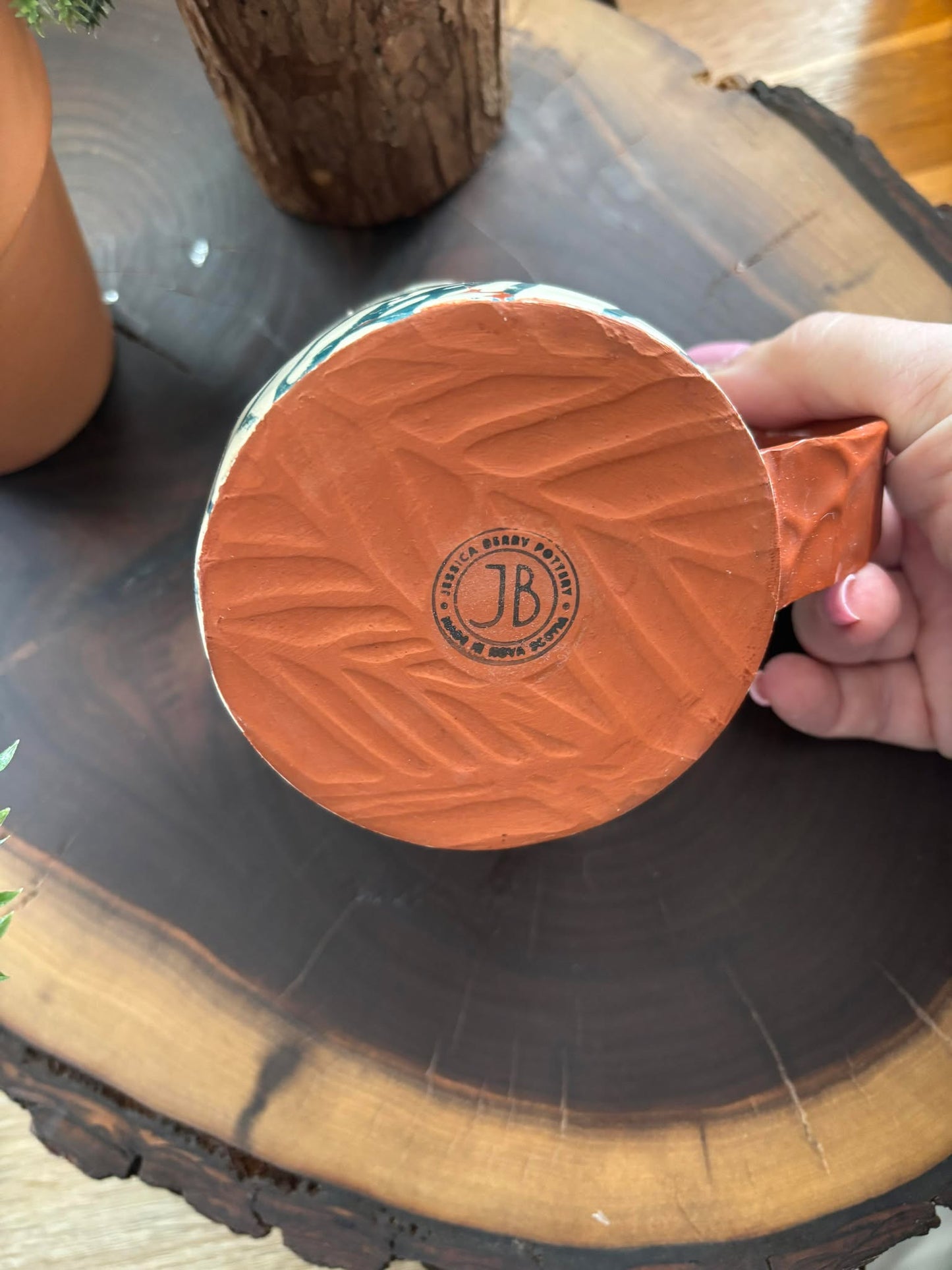 "NEW" POTTERY MUG - BLUE LEAVES